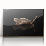 Framed wall art showcasing a vibrant lizard design with intricate details and a stylish gold frame, perfect for reptile lovers and modern home decor.
