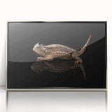 Framed wall art showcasing a vibrant reptile lizard design in acrylic with a sleek silver frame, perfect for enhancing modern decor and reptile enthusiasts' spaces.