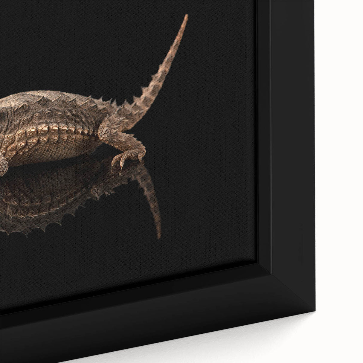 Close-up view of a framed canvas artwork featuring a vibrant lizard design, showcasing intricate details in bright greens and blues, perfect for reptile lovers and modern decor.