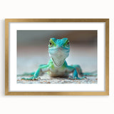 Gold-framed wall art showcasing a vibrant reptile lizard design, featuring intricate details and a decorative mat, perfect for enhancing home decor.