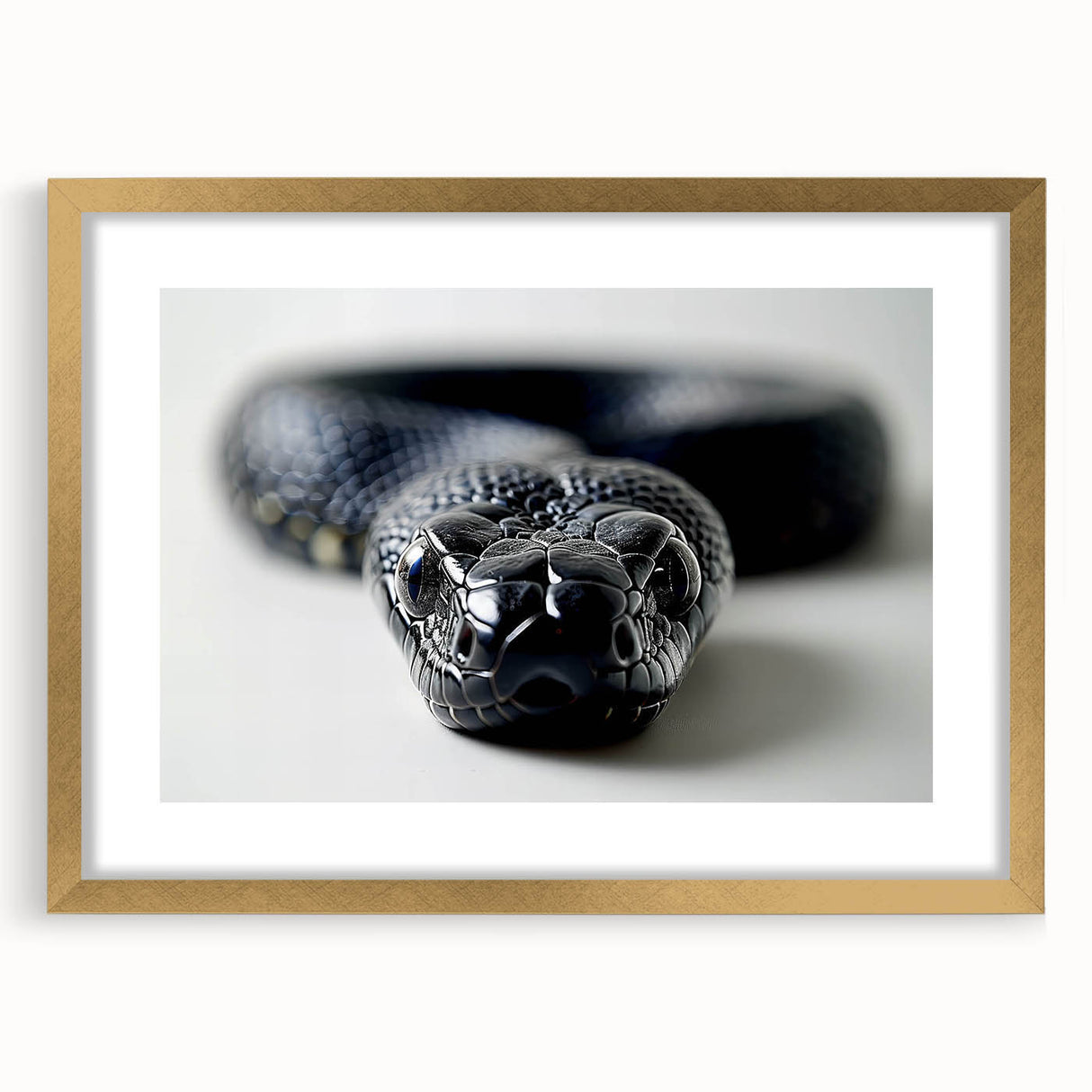 Framed wall art showcasing a striking snake design in gold, featuring a decorative mat, perfect for enhancing modern home decor with a touch of nature-inspired elegance.