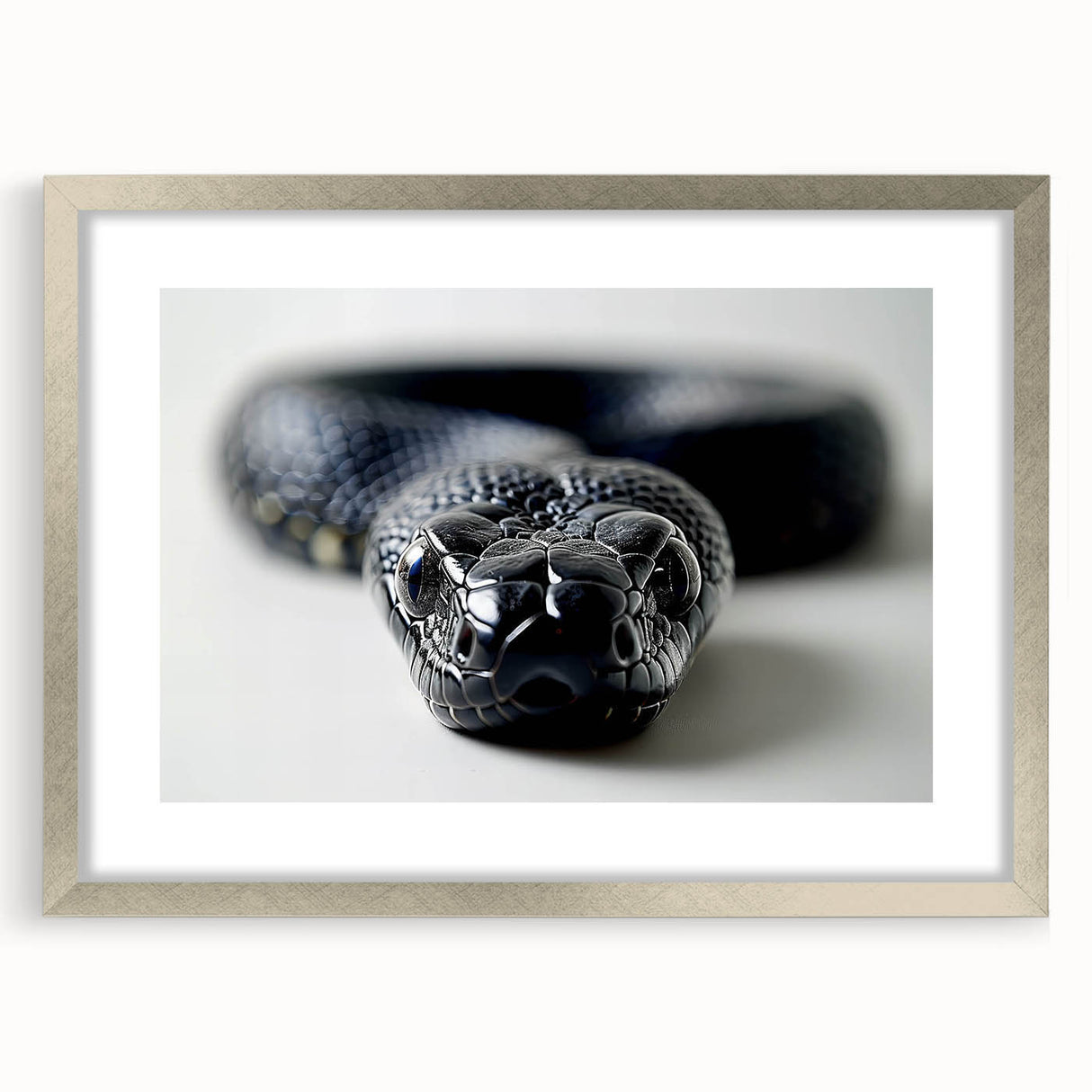 Framed wall art featuring a detailed snake design in silver tones, showcasing intricate scales and patterns, ideal for reptile enthusiasts and modern decor.