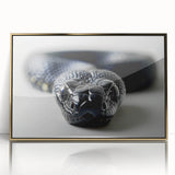 Framed wall art featuring a striking snake design in gold acrylic, showcasing intricate details and a modern aesthetic, perfect for reptile enthusiasts and home decor.