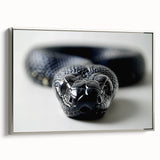 Framed wall art showcasing a detailed silver snake design on textured canvas, perfect for reptile enthusiasts. The piece adds a modern touch to any decor.