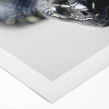Rolled canvas wall art showcasing an intricate snake design in vibrant colors, perfect for reptile enthusiasts and home decor, packaged securely in a cardboard tube.
