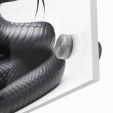 Close-up of a vibrant acrylic glass wall art piece showcasing an intricate snake design, featuring vivid colors and detailed textures, perfect for reptile enthusiasts.