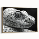 Framed wall art featuring a striking snake design, displayed in a sleek gold frame, showcasing intricate details and vibrant colors, perfect for reptile enthusiasts.