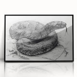 Framed wall art featuring a striking reptile snake design with vibrant colors and intricate details, set in a sleek black frame, perfect for enhancing modern decor.