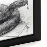 Close-up of a framed wall art piece showcasing a detailed snake design, featuring vibrant colors and intricate patterns, ideal for reptile enthusiasts and modern decor.