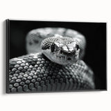 Framed wall art featuring a detailed snake design in a black frame, showcasing intricate patterns and textures, perfect for reptile enthusiasts and modern decor.