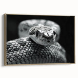 Framed wall art featuring a vibrant reptile snake design on canvas, showcasing intricate details in gold tones, perfect for enhancing modern decor.