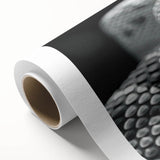 Rolled canvas showcasing a vibrant snake design wall art collection, featuring intricate patterns and colors, elegantly packaged in a protective cardboard tube.