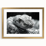 Framed wall art featuring a stylish reptile snake design in gold, showcasing intricate details and vibrant colors, ideal for modern home decor.
