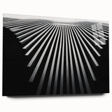 Large abstract wall art on acrylic glass featuring swirling blue and gray tones, ideal for bedroom or dining room decor.