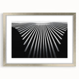 Abstract art print featuring swirling blue and gray tones on a framed canvas, suitable for dining room or bedroom decor.