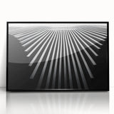 Large abstract wall art featuring swirling blue and gray tones on a framed acrylic, suitable for modern living room decor.