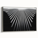 Vintage poster art on a framed canvas depicting colorful, oversized floral patterns on a black background.