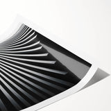 Extra large wall art featuring a line art design of flowers in black and white on a rolled canvas.