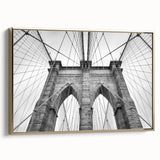 Framed canvas featuring a vintage landscape painting with colorful art elements and black accents.