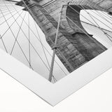 Art deco poster featuring a geometric pattern in gold and black on a rolled canvas, suitable for dining room decor.