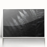 Framed white acrylic display featuring a sleek, modern design with a minimalist aesthetic, perfect for showcasing art or photographs in contemporary decor.