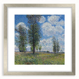 Textured abstract art print in soft blue and gray hues, framed in silver, suitable for bedroom decor.