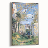 Framed canvas of a Camille Pissarro landscape painting, featuring vibrant green and blue tones.