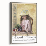 Framed canvas featuring a landscape art painting by Camille Pissarro with colorful trees and a silver frame.