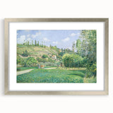 Textured art print of abstract design in muted earth tones on a silver-framed canvas, suitable for bedroom decor.