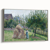 Framed canvas of a Camille Pissarro landscape painting, featuring vibrant green and earth tones.