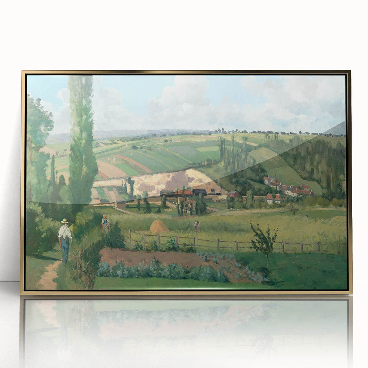 Large art print of Camille Pissarro's impressionist painting in a gold frame.