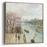Framed canvas depicting a Camille Pissarro landscape art painting with colorful trees and a silver frame.