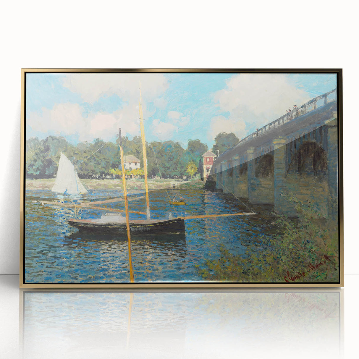 Large art print of Claude Monet's impressionist painting, with vibrant green and blue tones, framed in gold acrylic.