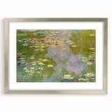 Textured abstract art print of a Claude Monet painting in muted colors, framed in silver, ideal for bedroom art.