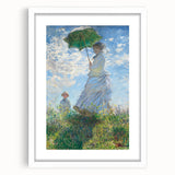 Abstract art print of a Claude Monet painting with soft pastel colors on a white framed canvas.