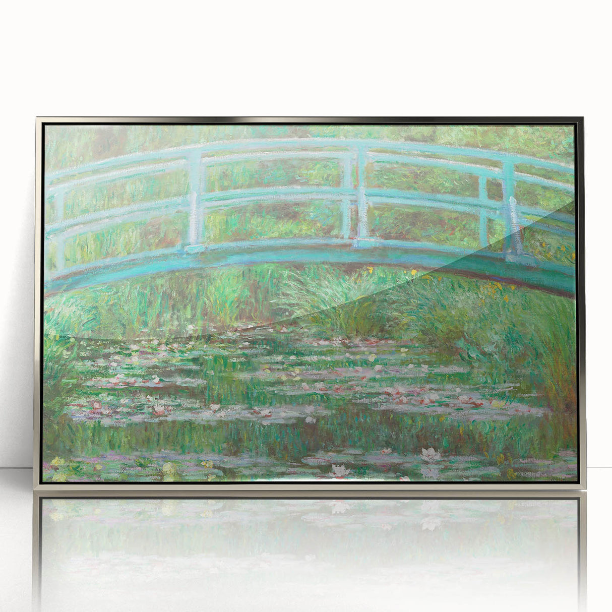 Mid-century modernist art depicting a Claude Monet landscape in pastel shades, framed in silver acrylic.
