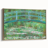 Framed canvas featuring a Claude Monet landscape painting in muted greens and blues, ideal for bedroom wall art.