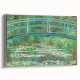 Framed canvas depicting a Claude Monet landscape with vibrant colors, ideal for adding a vintage touch to any room.