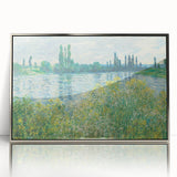 Mid-century modernist art featuring a Claude Monet landscape with muted greens and blues on a silver-framed acrylic print.