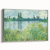 Silver-framed canvas of a Claude Monet landscape painting in muted greens and blues, ideal for bedroom wall art.
