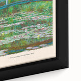 Close-up of a textured Claude Monet painting on black framed canvas, featuring vibrant, colorful brushstrokes.