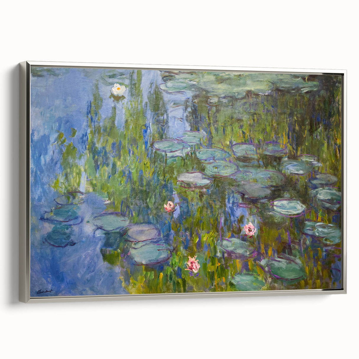 Framed canvas of Claude Monet's landscape painting featuring vibrant colorful art on a black background.