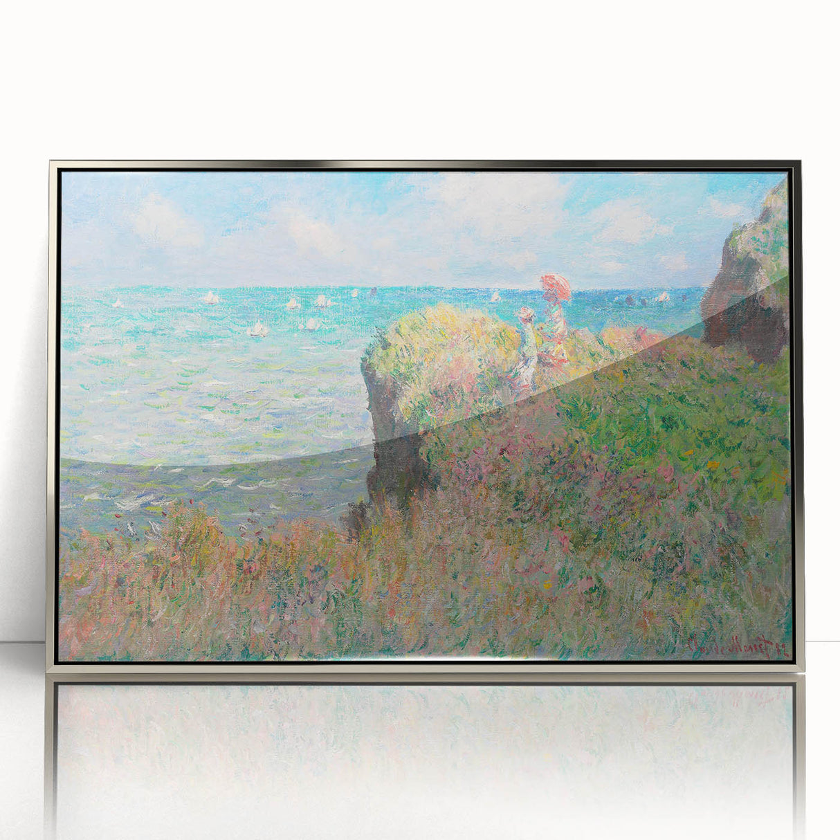 Mid-century modernist art featuring a Claude Monet landscape with soft blue and green hues on a framed acrylic.