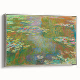 Framed canvas featuring a Claude Monet landscape painting with colorful foliage and a silver frame.