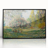 Large abstract wall art depicting a Claude Monet-inspired scene in muted green and blue tones, framed in black acrylic.
