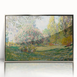 Mid-century modernist art featuring a Claude Monet landscape in muted pastel shades, silver-framed acrylic.
