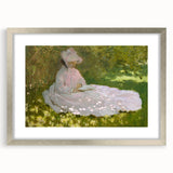 Textured art print of an abstract Claude Monet-inspired scene in soft blue and green hues on a framed silver mat.