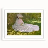 Abstract art print of a Claude Monet-inspired landscape in muted blue and green tones on a white framed canvas.