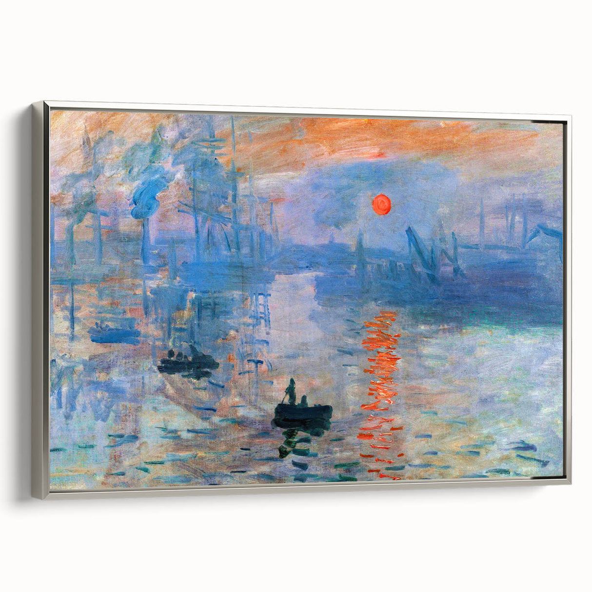 Silver-framed canvas featuring a Claude Monet landscape painting with colorful art.