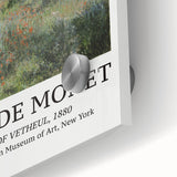 Close-up of a large abstract wall art by Claude Monet with vibrant blues and greens on acrylic glass.